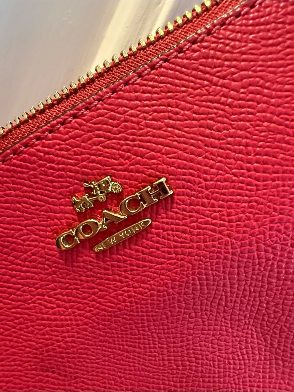 Coach Pink Pebbled Leather Wristlet with Gold Hardware